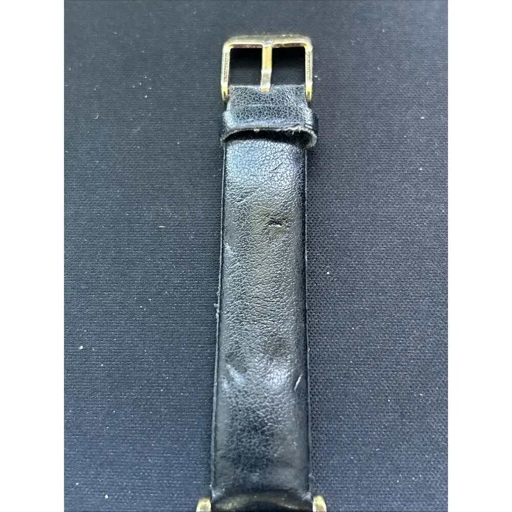 Gold Tone Pearlized Dial Black Band Women’s Quartz Watch